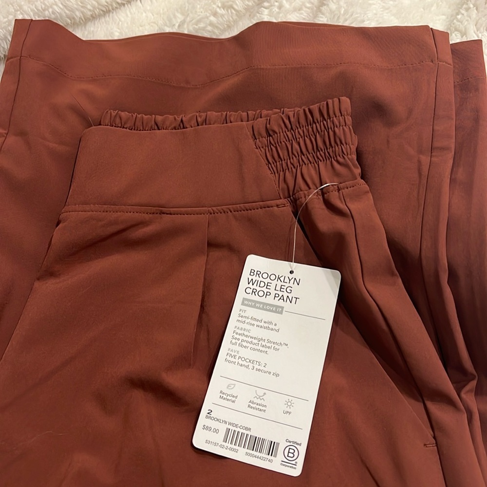 Athleta Brooklyn cropped wide leg pant. NWT. Maroon-ish.